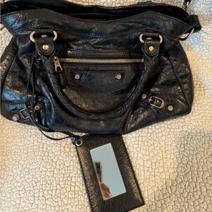 Balenciaga black purse.